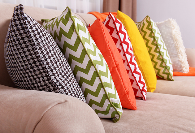 Colorful Pillows Lined Up On The Couch