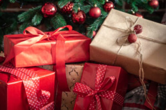 Closeup Red Gift Boxes Near Christmas Tree 300X200 1