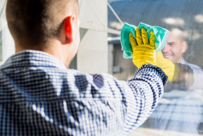 Close Up Man Cleaning His House