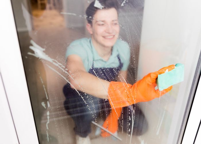 Portrait Man Cleaning His House