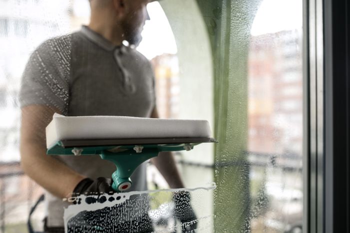 Man Doing Professional Home Cleaning Service 3