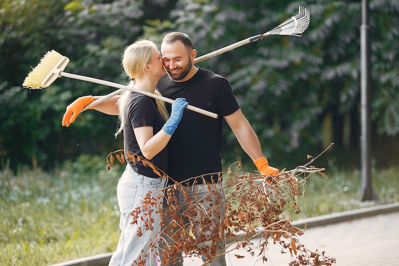 Couple Collects Leaves Cleans Park