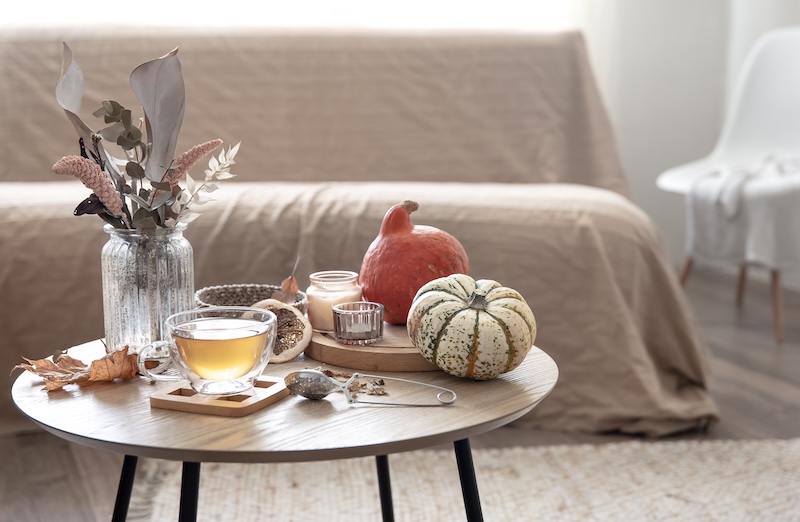 Cozy Home Still Life With Cup Tea Pumpkins Candles Autumn Decor Details Table Blurred Background Room