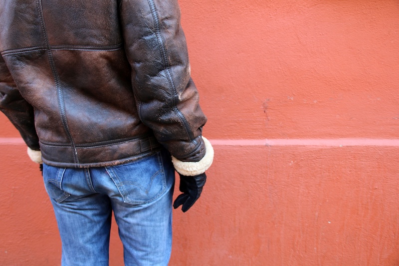Midsection Man Standing Against Wall