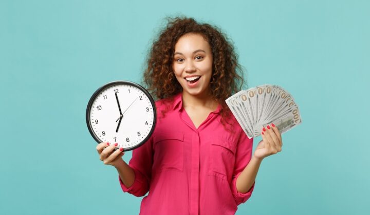 A woman holds a clock in one hand and money in the other, symbolizing the value of time and financial resources.