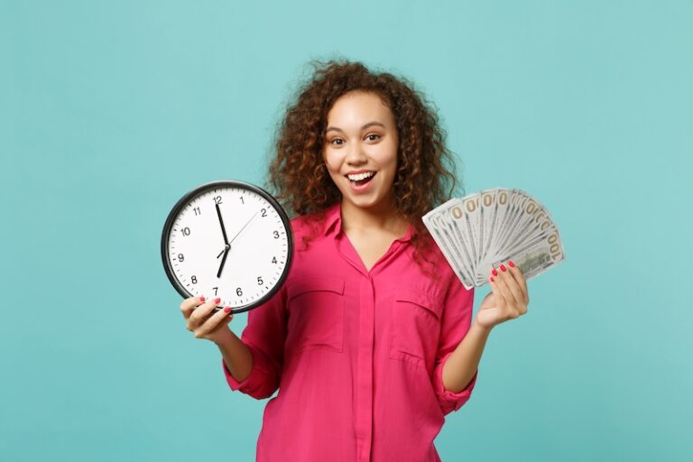 A woman holds a clock in one hand and money in the other, symbolizing the value of time and financial resources.