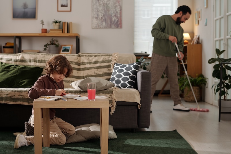 Adorable Boy Drawing With Crayons