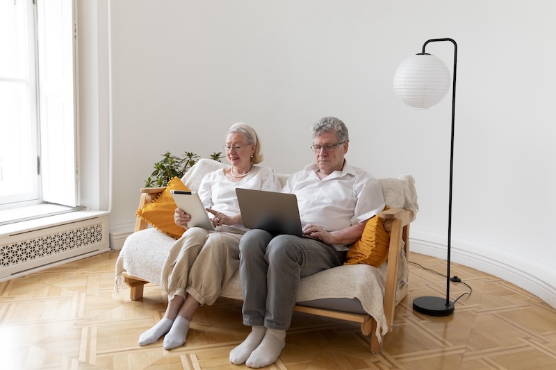 Beautiful Grandparents Couple Learning Use Digital Device