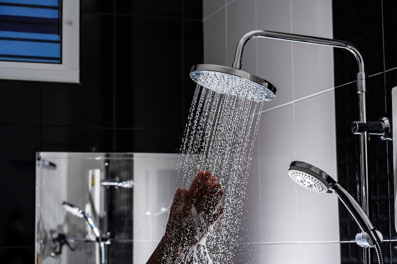 Close Up Water Flowing From Shower Bathroom