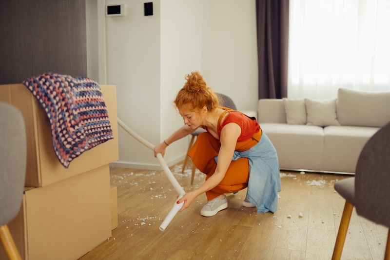 Nice Red Haired Woman Looking Floor