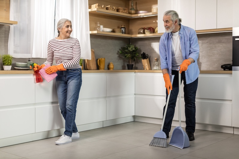 Portrait Happy Senior Spouses Making Cleaning Kitchen Together 1