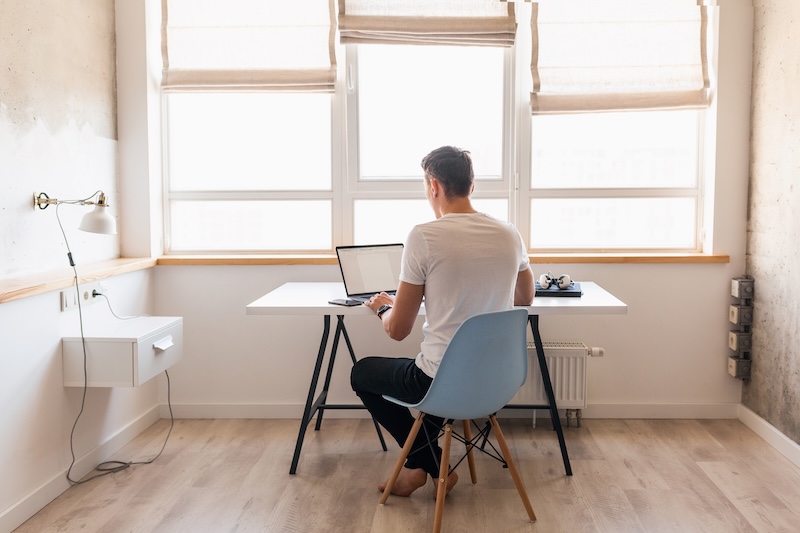 Modern Young Handsome Man Casual Outfit Sitting Table Working Laptop Freelancer Home